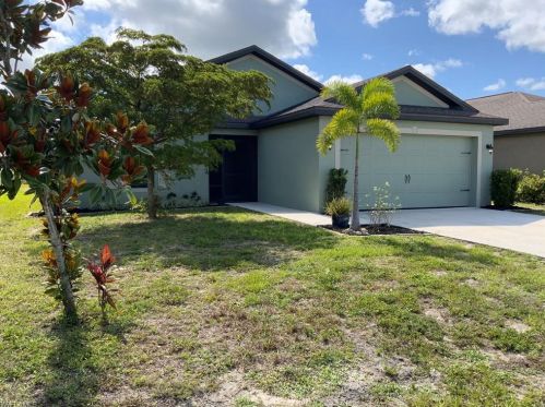 382 Shadow Lakes Dr, Lehigh Acres FL  33974-0807 exterior