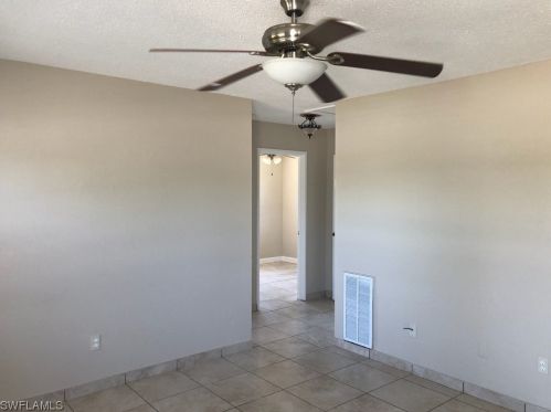 302 Arthur Ave, Lehigh Acres FL  33936-7410 exterior