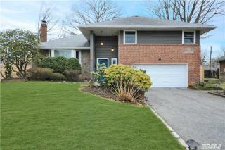 194 Hazelwood Dr, Westbury, NY 11590-1212
