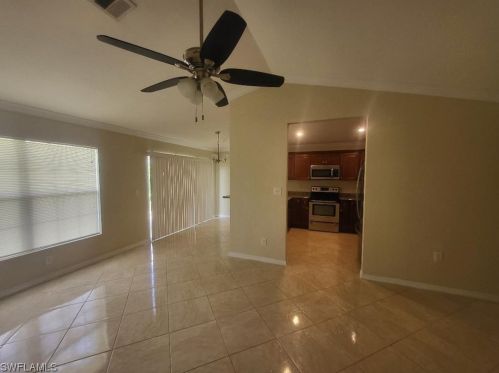 387 Carrillon Ave, Lehigh Acres FL  33974-5902 exterior