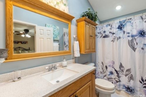 54 Scenic Hills Dr, Panamoka NY  11961-3024 exterior