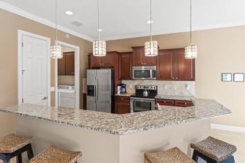 9463 Quarry Dr, Naples FL  34120-5223 exterior
