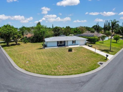 102 Stafford Pl, Lehigh Acres FL 33936-5954 exterior