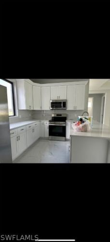 627 2nd Ter, Cape Coral, FL 33990-0011