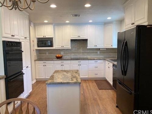 9237 Manzanar Ave, Downey CA  90240-2807 exterior