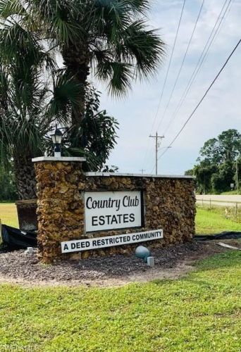 1665 Country Clb Pkwy, Lehigh Acres FL 33936-0053 exterior