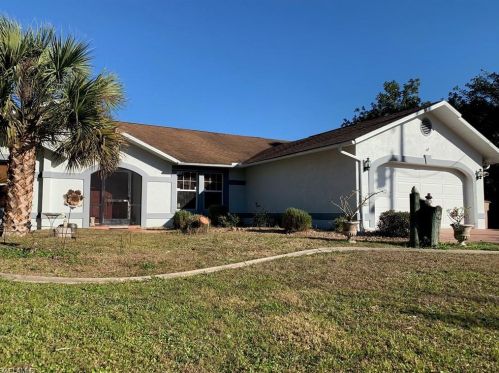 414 Palmetto Ave, Lehigh Acres FL 33972-7859 exterior