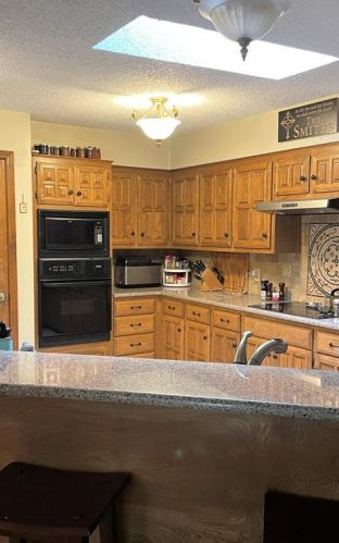 303 Owl Tree Trl, Greenville TX  75402-4214 exterior