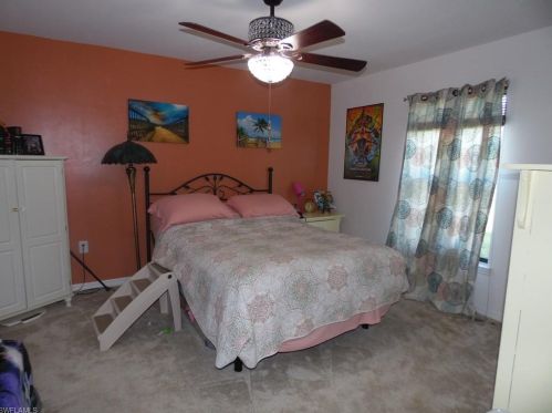 213 Shadow Lakes Dr, Lehigh Acres FL  33974-0806 exterior