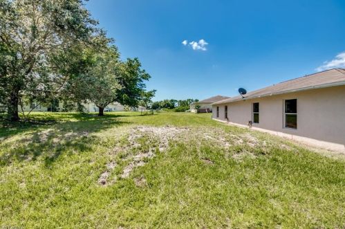 217 Ivan Ave, Lehigh Acres FL 33973-2011 exterior