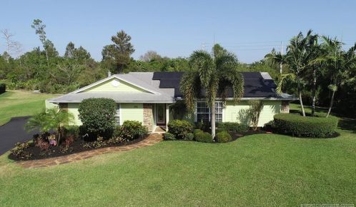 2022 Racquet Club Dr, Palm City, FL 34990-2302