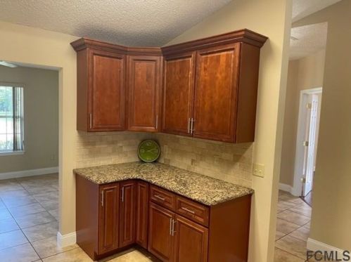 129 Fort Caroline Ln, Palm Coast FL  32137-4456 exterior