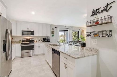 1027 Cedartree Ave, Lehigh Acres, FL 33971-7588