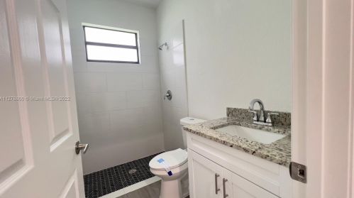 546 Aspen Ave, Lehigh Acres FL 33974-9613 exterior