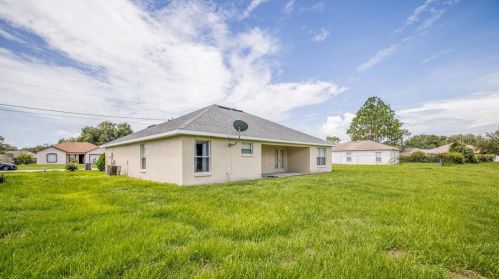 415 Cardinal Ct, Kissimmee FL  34759-4424 exterior