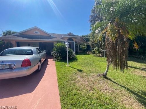 401 Hibiscus Ave, Lehigh Acres, FL 33972-7716
