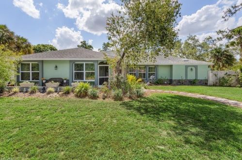 505 Thompson Ave, Lehigh Acres, FL 33972-4104