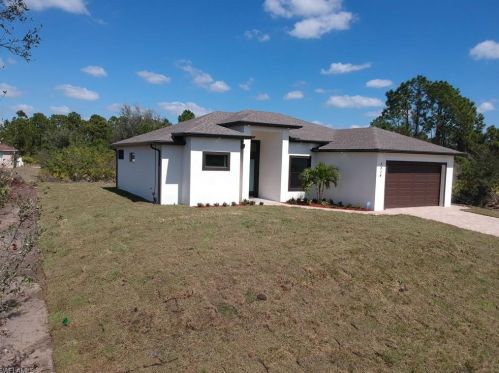 823 Sentinela Blvd, Lehigh Acres FL 33974-9535 exterior