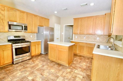 21226 Rush Hollow Ct, Richmond, TX 77407-2486