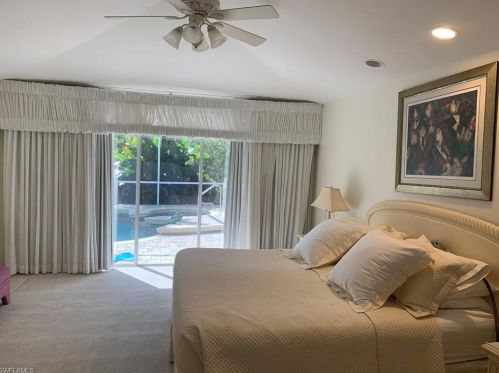 1575 Whispering Oaks Cir, Naples, FL 34110-4140