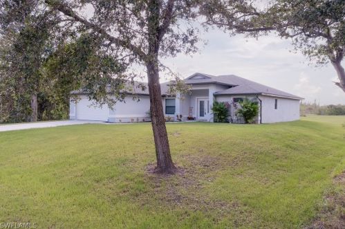 1719 Robert Ave, Lehigh Acres FL 33972-2408 exterior