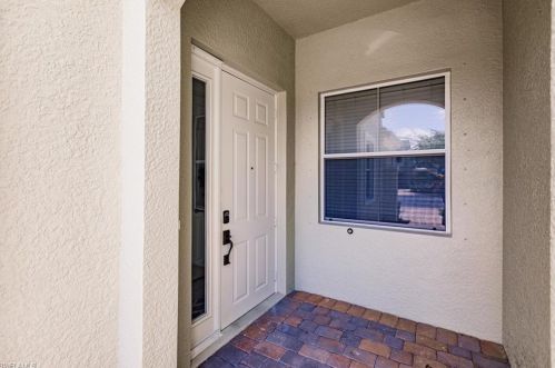 1455 Mariposa Cir, Naples FL  16103-7254 exterior