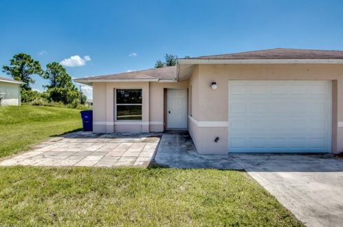 217 Ivan Ave, Lehigh Acres FL 33973-2011 exterior