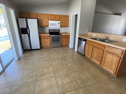 1023 Mark Ave, Lehigh Acres, FL 33974-9672
