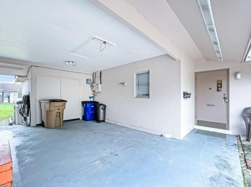 279 Rosewood Ct, Lehigh Acres FL  33936-1448 exterior