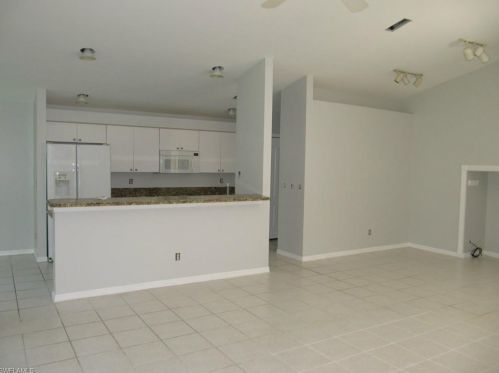 2224 Heritage Greens Dr, Naples FL  34119-3310 exterior