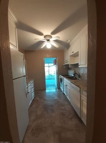 50 Dawn Flower Cir, Lehigh Acres FL 33936-0073 exterior