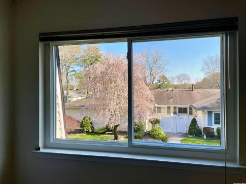 63 Storm Dr, Holtsville NY  11742-1909 exterior