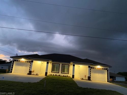 719 Harry Ave, Lehigh Acres FL  33973-1115 exterior