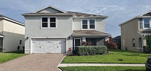 10317 Canal Brook Ln, Lehigh Acres, FL 33936-6653