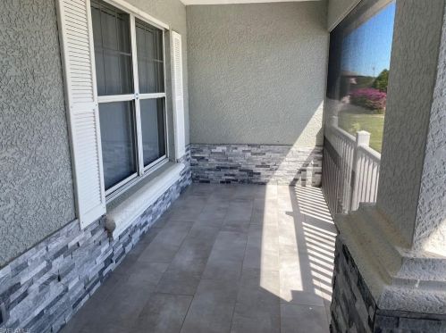 145 Peerless St, Lehigh Acres FL 33974-9455 exterior