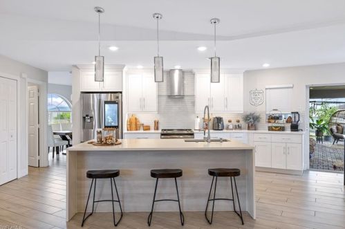 1023 Carl Ave, Lehigh Acres FL 33971-8523 exterior