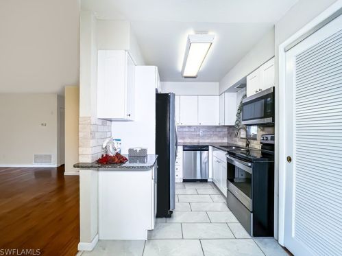 279 Rosewood Ct, Lehigh Acres FL  33936-1448 exterior