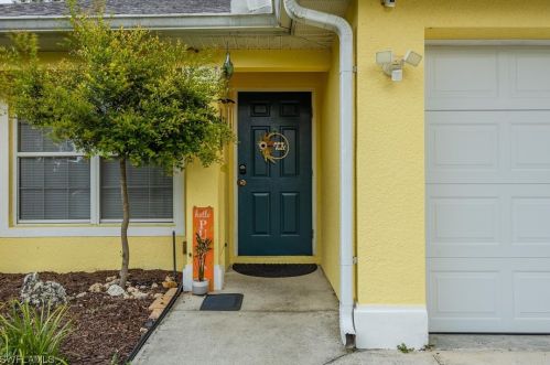 411 Chalet Ave, Lehigh Acres, FL 33974-5903