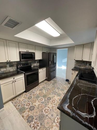 218 Roosevelt Ave, Lehigh Acres FL 33972-1200 exterior