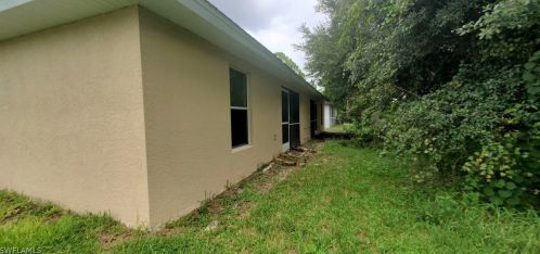 613 Hawthorne Ave, Lehigh Acres FL 33974-9772 exterior