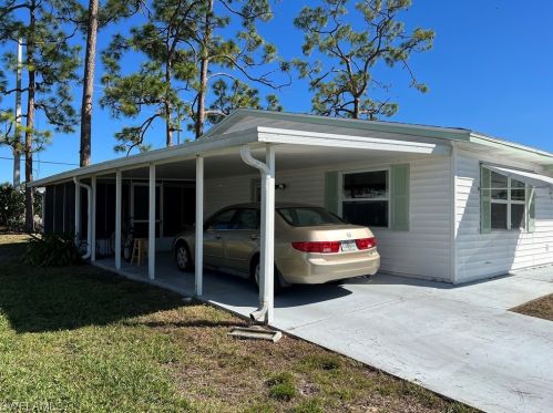 14 Desert Candle Cir, Lehigh Acres FL 33936-7360 exterior