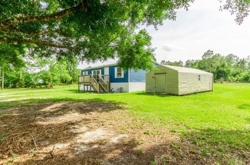 3207 Cypress Trails Dr, Polk City FL  33868-9487 exterior