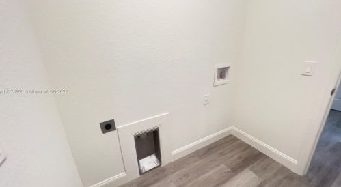 546 Aspen Ave, Lehigh Acres FL 33974-9613 exterior