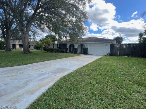 1422 Caywood Cir, Lehigh Acres FL  33936-5960 exterior
