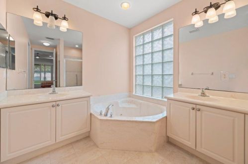 707 Belle Grv Ln, West Palm Beach FL  33411-4545 exterior