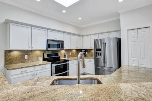 302 Stanhope Cir, Naples FL  34104-0812 exterior