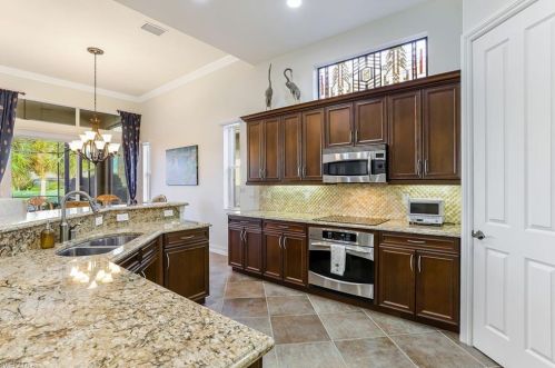 6488 Caldecott Dr, Naples FL  34113-3193 exterior