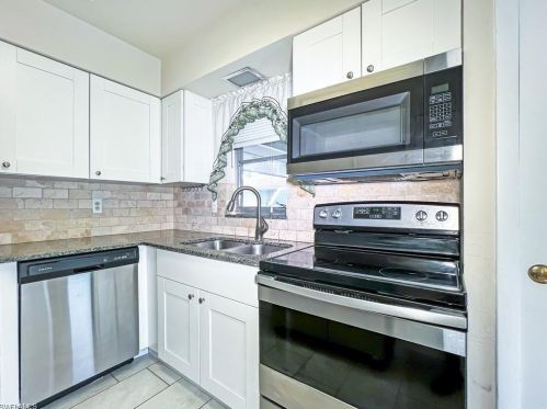 279 Rosewood Ct, Lehigh Acres FL  33936-1448 exterior