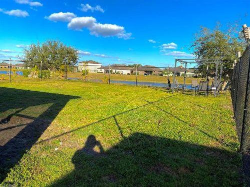 354 Shadow Lk Dr, Lehigh Acres FL 33974-0826 exterior