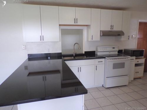 897 36th Ter, Palm City, FL 34990-3516